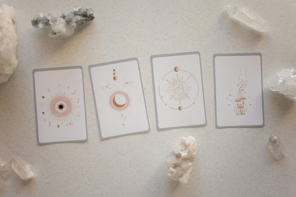 Top view of tarot cards and crystals, perfect for spiritual and mystical themes.